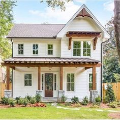 a large white house with two story windows