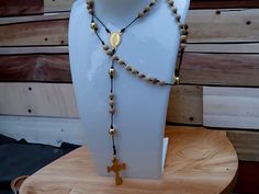 Knotted Rosary Necklace made with Chinese knotting cord & wooden beads combined with golden stainless steel beads and golden cross.