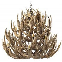 an antler chandelier hanging from a chain