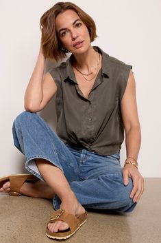 Elevate your everyday tops with this easy button-down from EVEREVE. Crafted in Lyocell, this top features a spread collar, a sleeveless silhouette with bra-friendly gussets at the arm holes, and a flattering twist at the hemline. Green Satin Top, Satin Top Blouses, Leather Blouse, Crinkle Top, Green Long Sleeve Top, Crossover Top, Black Mesh Top, Exclusive Dress, Leopard Print Blouse