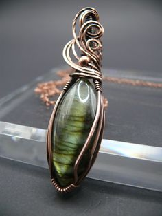 This Pendant Necklaces item is sold by ZankinsCreations. Ships from United Kingdom. Listed on Aug 28, 2024 Wire Wrapped Labradorite Oval Pendant Jewelry, Wire Wrapped Labradorite Oval Pendant Necklace, Electroformed Labradorite Necklaces For Healing, Green Labradorite Wire Wrapped Jewelry, Spiritual Green Labradorite Necklaces, Nature-inspired Hand Wrapped Labradorite Necklace, Spiritual Green Labradorite Necklace, Wired Jewelry, Copper Jewellery