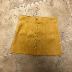 Brand New Mustard Suede Mini Skirt Faux Snaps Down Front Zipper Closure On Back Forever 21 Lined Skirt For Fall, Forever 21 Lined Mini Skirt For Fall, Forever 21 Lined Skort For Fall, Forever 21 Skort With Lined Skirt For Fall, Forever 21 Brown Bottoms For Fall, Forever 21 Skirt For Fall, Forever 21 Fall Lined Skirt, Forever 21 Fall Skirt, Yellow Mini Lined Skirt