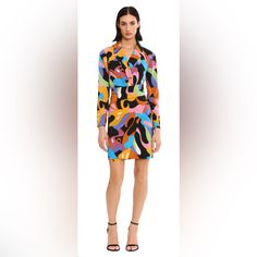 Featuring A Vibrant, Colorful Pattern And A Classic Collared Design, The Donna Morgan Serendipity Dress Is A Stylish Must-Have For Any Occasion. Washed Cdc | 97% Polyester, 3% Spandex This Dress Is Bodice Lined In 100% Polyester. Missy Dress Shown Is A Size 8/M And Dress Length From Center Back Neck To Hem Is 35 1/8". Missy Model In Navy/Light Blue Is 5'10" Tall, With A 31.5" Bust, 24.5" Waist, And 37" Hip Measurement. No, This Dress Does Not Have Pockets. Dry Clean Vibrant Long Sleeve Mini Dress For Spring, Orange Dresses With Bold Print For Spring, Spring Fitted Mini Dress With Bold Print, Fitted Multicolor Wrap Dress For Summer, Fitted Multicolor Print Dress For Fall, Spring Orange Dresses With Bold Print, Chic Fitted Multicolor Wrap Dress, Multicolor Summer Wrap Dress, Chic Multicolor Wrap Dress For Spring