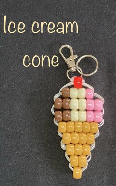 an ice cream cone shaped keychain made out of candy