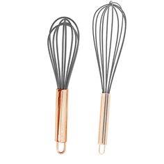 two metal whisks with copper colored handles on white background, side by side