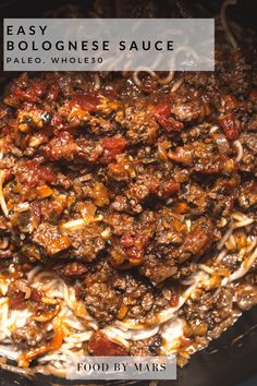 a close up of food in a pan with text overlay that reads easy bologi cheese sauce