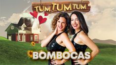 two beautiful women standing next to each other in front of a sign that says tum - tum