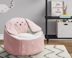 a child's room with a pink bunny chair