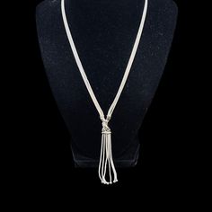 "Triple Strand Silver Tone Snake Chain Necklace With A Tassel. There are no hallmarks on it. It has a lobster clasp. The necklace is adjustable from 20\" to 23\" The tassel hangs down an extra 3\" It comes with a gift box. (Jewelry #4703) USA Seller!! Estate sale find. We do not Clean or Polish our Estate Jewelry we will leave that to you. We also have Jewelry, Hallmark Ornaments, Dept 56, Vintage Glassware and many other items. We will combine shipping for multiple items if possible. Features: * Tassel Size: Womens Adjustable from 20\" to 23\" Condition: Pre-Owned Like New" Metal Lariat Tassel Necklace With Adjustable Chain, Adjustable Metal Lariat Tassel Necklace, Adjustable Fringe Dangle Necklace, Adjustable Metal Tassel Necklace As Gift, Adjustable Lariat Jewelry With Tassels, Adjustable Metal Dangle Tassel Necklace, Adjustable Metal Tassel Dangle Necklace, Metal Tassel Dangle Necklace, Adjustable Silver Long Tassel Necklace