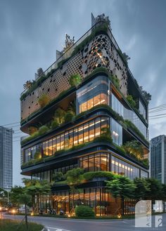 a tall building with lots of windows and plants growing on the top of it's sides