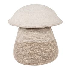 a white and beige basket sitting on top of a table