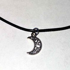 Stainless Steel Ornate Moon Amulet Protect your energy with this beautiful moon amulet. Stainless Steel18” braided cord, adjustable Comes with a black organza drawstring bag Goth Items, Moon Amulet, Protect Your Energy, Moon Crescent, Wicca Witchcraft, Fresh Fashion, Beautiful Journals, Goth Jewelry, Pendent Necklace