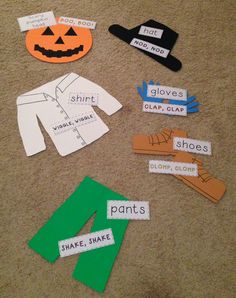 paper cutouts with clothes and pumpkins on the floor next to eachother