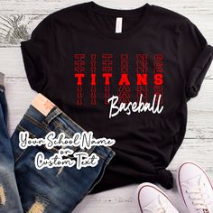 there is a t - shirt with the words titans in red and white on it