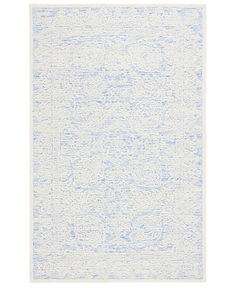 a blue and white rug on a white background