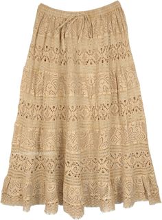 An ever-going classic lace style in a camel beige shade, this is a long skirt with an eclectic fabric style and a fresh look.  This enticing floral lace skirt has been made entirely from rayon lace (top layer), and has an inner lining in plain cotton. #tlb #Lace #TieredSkirt #vacationclothing #Floral #bohemianfashion #Laceskirt #Beigeskirt #Weddingskirt Tiered Maxi Skirt With Lace Patchwork For Summer, Summer Tiered Maxi Skirt With Lace Patchwork, Summer Lace Patchwork Maxi Skirt, Bohemian Tiered Skirt Bottoms With Lace Patchwork, Casual Long Lace Skirt, Beige Flowy Lace Skirt, Bohemian Beige Skirt For Spring, Beach Lace Skirt With Lace Trim, Beige Lace Tiered Skirt