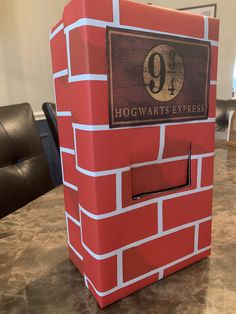 the hogwart's express box is made out of cardboard and sits on a table