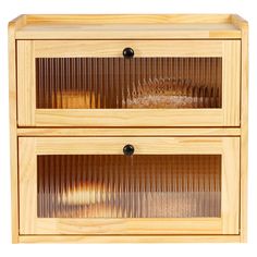 two wooden drawers with glass doors on each side