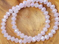 Pale Pink Stretch Bead Bracelet Stretch Bracelet Cheap Pink Hand-strung Beaded Bracelets, Pink Beaded Bracelets, Bead Bracelet, Stretch Bracelet, Lokai Bracelet, Stretch Bracelets, Pale Pink, Live Lokai Bracelet, Beaded Bracelets