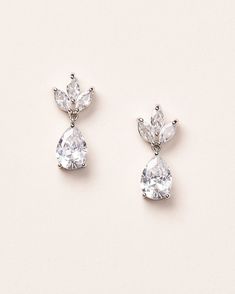 "PETITE FLEURETTE CZ EARRINGS (JE-4313) Simple & elegant, our Petite Fleurette Earrings are designed with three marquise CZ stones accented with a pear shaped drop. DETAILS * Cubic zirconia * Measures 0.25\" x 0.5\" * Hypoallergenic, lead-free & nickel-free SHOP MORE STYLES https://www.etsy.com/shop/darethcolburndesigns NEED MORE HELP? Happy to offer advice or recommendations, just message me!" Bridal Earrings Silver, Ribbon Headbands, Silver Wedding Jewelry, Jewelry Website, Discount Jewelry, Jewelry Bridal, Free Style, Cz Earrings, Crystal Drop Earrings