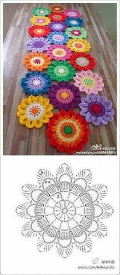 crocheted flowers are laid out on the floor and ready to be made into an afghan