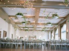 an empty banquet hall with tables and chairs