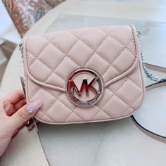 Brand New With Tag Never Used ! 100% Authentic Color : Light Cream Rp:$198$+Tax 6-1/2" W X 5-1/2" H X 2-1/4" D Silhouette Is Based Off 5'9" Model. Magnetic Closure Adjustable Crossbody Strap With 17" Drop Silver Tone Hardware; Quilted Exterior; Back Slip Pocket; Logo Medallion At Front Nice Gift Or Good Choice To Treat Self 819 Silver Bag With Metal Logo For Everyday Use, Chic Bags With Silver-tone Logo Plaque For Everyday Use, Michael Kors Silver Shoulder Bag With Branded Hardware, Travel Bags With Silver-tone Logo Plaque, Michael Kors Luxury Silver Shoulder Bag, Shoulder Bag With Silver-tone Logo Plaque For Everyday Use, Luxury Silver Michael Kors Shoulder Bag, Silver-tone Logo Plaque Shoulder Bag, Michael Kors Shoulder Bag With Metal Logo