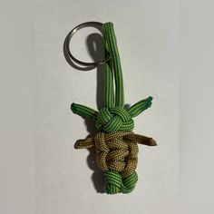 a keychain made out of rope and beads