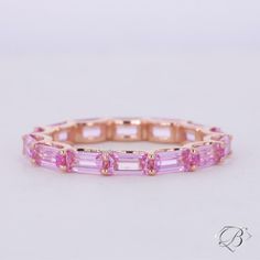 an image of a pink bracelet on a white background