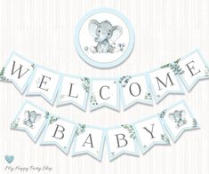 a welcome baby banner with an elephant on it