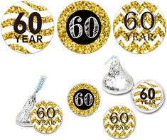 60th birthday decorations with gold glitter and black numbers on them, including the number 60 year