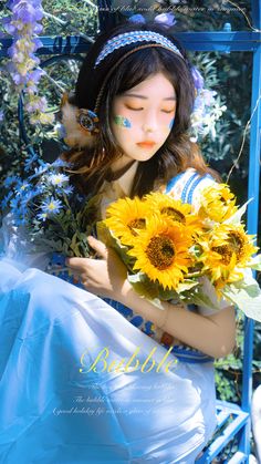 a doll with sunflowers in her hands