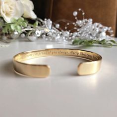 Don't settle for ordinary gifts when you can create something extraordinary. Our engraved bracelets are the epitome of personalization, allowing you to celebrate birthdays in a truly unforgettable way. - 22K gold plated bracelet  - Your engraving outside or inside the cuff  - Up to 90 characters on each side - Approximately 8mm wide  SIZES: This is the length of the metal, not including the opening between the ends. The bracelets are adjustable. 4" (baby/toddler size) 5" (child size) 6" (standar 90 Characters, Custom Engraved Bracelet, 4 Baby, Men Birthday, Gift Bracelet, Custom Bracelet, Gold Plated Bracelet, Small Jewelry Box, Engraved Bracelet