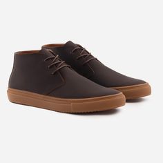 A perfect pair. With the Toledo Chukka Sneakers in robust pull-up leather, you get the best of what a chukka boot and a sneaker have to offer. The wide, almost sculptural quarters and ankle-length shaft of the chukka pair beautifully with the resilient rubber soles and relaxed appeal of sneakers. Wear them with shorts, jeans, and your more casual pants for a dynamic look that sets you apart from the crowd. This product is made from robust pull-up leather sourced from a Gold-Rated tannery based in Arzignano, Italy. Being the highest level of recognition awarded by the Leather Working Group, a Gold rating signifies the leather manufacturer meets the most stringent criteria and demonstrates a strong commitment to mitigating its environmental impact. Brown High-top Desert Boots With Textured Sole, Brown Low-top Chukka Boots With Textured Sole, Casual Leather Chukka Boots With Contrast Sole, Leather Chukka Boots With Contrast Sole, High-top Leather Desert Boots With Rubber Sole, High-top Leather Desert Boots With Contrast Sole, Leather High-top Desert Boots With Rubber Sole, Brown High-top Chukka Boots With Rubber Sole, Brown Rugged High-top Chukka Boots