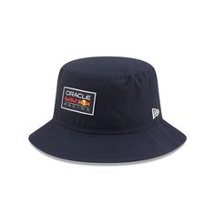 The Oracle Red Bull Racing Repreve Bucket Hat features a rubber Oracle Red Bull Racing patch at the front with a screen-printed team logo at the rear. Sporty Hats With Logo Patch For Sports Events, Curved Brim Sports Hat With Logo, Curved Brim Hat With Logo For Sports Events, Sporty Logo Hats For Sports Events, Sports Hats With Logo Patch And Flat Brim, Flat Brim Sports Hats With Logo Patch, Casual Fan Merchandise Hat With Logo Patch, Casual Hats With Logo Patch For Fans, Sports Visor Hat With Logo Patch