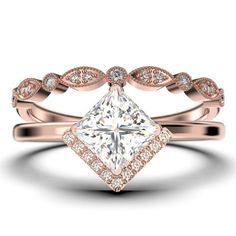 a rose gold engagement ring set with a princess cut diamond in the center and two rows of diamonds on each band