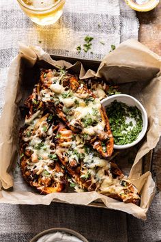 some food is sitting in a box on a table