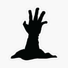 a hand sticking out from the ground with its fingers up sticker on top of it