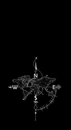 a black and white drawing of a compass on a dark background with the word w in it's center