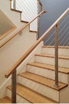 Dogleg stairs with cable railing Stairs With Wire Railing, Staircase With Wire Railing, Stair Wire Railing, Stair Railing Kits Indoor, Internal Balustrade Ideas, Staircase Banister Ideas Metal, Balistraids Stairs, Wood And Wire Railing, Wire Railings For Stairs