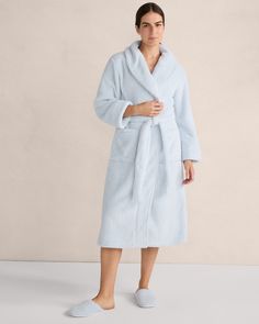 Deep, luxe plush fleece is crafted into a robe you’ll want to stay in all morning. With a self-tie belt and front pockets to keep necessities nearby. | This product’s overall fiber content is made with at least 50% of an environmentally preferred fiber. Learn more about our efforts to design planet-friendly apparel here. Details + Design: Long sleeve. Self-tie belt. Hits mid calf. Length: 46 "Material: 100% Recycled PolyesterCare: Machine Wash; Tumble Dry Low, Cool Iron if NeededImported | Dream Flannel Robe, Blue Comforter, Blue Flannel, Belt Tying, Tie Belt, Mid Calf, Daily Dose, Design Details, Overalls