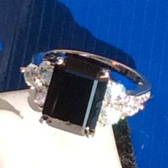 "Luxury 7ct (9*12mm) Emerald Cut Super Sparkling Simulated Created Black  Diamond Engagement Ring in Real Solid 925 Sterling Silver Condition:New Main Stone Color: Black  Main Stone Shape : Emerald Cut Cutting:Excellent Natural/Lab-Created:Lab-Created Sizable:Yes Metal Purity:925 parts per 1000 Brand:Auz Jewellery AUZJ. Hallmark: AUZJ925s Plating: Rhodium Plated Stones Setting: Prong Setting Quality: Super High Quality CZ,  Guarantee: High Quality Stones, Our Silver is NOT Silver Plated or something just \"stamped 925\" but  100% Real Genuine Solid 925 Sterling Silver Seller Notes:\"Top Quality. Special Excellent Cutting. Special Design. Well made. Super High Quality. Solid. 100% 925 Silver. 9*12mm Main Stone. Supper Sparkly. Multi-sizes. Stunning Ring.\" INTERNATIONAL RING SIZE CHART:   R Black Diamond Engagement Ring, Girls Jewelry Box, Black Diamond Engagement, Black Diamond Ring Engagement, Platinum Jewelry, White Gold Wedding Rings, Morganite Ring, Gold Wedding Rings, Emerald Cut Diamonds