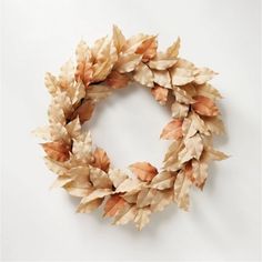 a close up of a wreath on a white surface