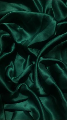 a dark green silk fabric with very thin folds