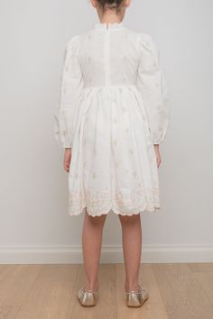 This dress features beautiful and delicate rose embroidery in an all-over scattered design with lavish hem embroidery. The sleeves are bracelet length and finished with an elastic cuff. The neck is high and the bust is fitted. The dress features a centre back zip for easy wear. 55% Linen 45% Cotton Cold wash Hem Embroidery, Embroidered Linen Dress, Blossom Embroidery, Embroidered Rose, Scallop Hem, Embroidered Linen, Rose Embroidery, Scalloped Hem, Petite Dresses