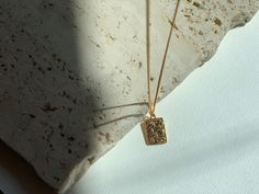 "Gold square pendant necklace - Details * 24K Gold plated - Measurements * Length: 45-50cm (Adjustable) * Pendant length: 1.5cm, Width: 1.1cm All jewelry are ready-for-gift, which come in beautiful packaging. [ Designed and Made in AnotherEast at New York Studio] ♥︎FOLLOW US HERE: https://www.pinterest.com/anothereast2019/ https://www.instagram.com/another.east/ * SHIPPING * All the orders will be shipped to the shipping address supplied through your Etsy Order. Please check the address is corre Gold Plated Charm Necklace With Square Pendant, Gold Rectangular Amulet Necklace, Gold Necklace With Square Coin Pendant, Gold Necklace Long, Layered Gold Necklace, Necklace Long Gold, Long Gold Necklace, Square Pendant Necklace, New York Studio