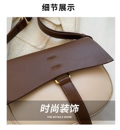 Brand Name: RemielShape: SaddlePlace Of Origin: ZHE JIANG ProvinceHandbags Type: Shoulder BagsTypes of bags: Shoulder & HandbagsOrigin: CN(Origin)Main Material: PUClosure Type: COVERHardness: HARDStyle: vintageModel Number: 1Lining Material: PolyesterOccasion: VersatileGender: WOMENPattern Type: panelledNumber of Handles/Straps: SingleInterior: Interior Zipper PocketInterior: Interior CompartmentItem Type: Handbags Armpit Bag, Womens Designer Handbags, Designer Handbag, Shoulder Messenger Bag, Saddle Bag, Luxury Brand, Saddle Bags, Bags Shoulder, Brand Names