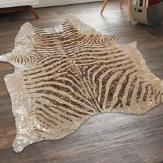 a zebra print rug on the floor in a living room