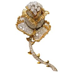 A stunning vintage brooch handmade in 18K and platinum set with approximately 13cttw in G-J color Vs1-Si2 clarity larger marquise cut and round diamonds. Dimensions/Weight 3 1/2” long by 1.50” wide. Weight is 24.30dwt. Condition All stones are secure and the pin is functional. Beautifully wearable. Gold Rose Flower, Antique Brooches, Red Jewelry, Diamond Brooch, 18k Gold Jewelry, Gold Brooches, Diamonds And Gold, Flower Pins, Brilliant Diamond