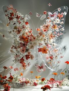 a glass sculpture with flowers and butterflies on it